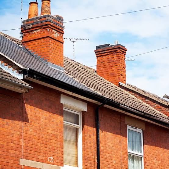Row of period houses with chimney stacks in Knighton, Leicester